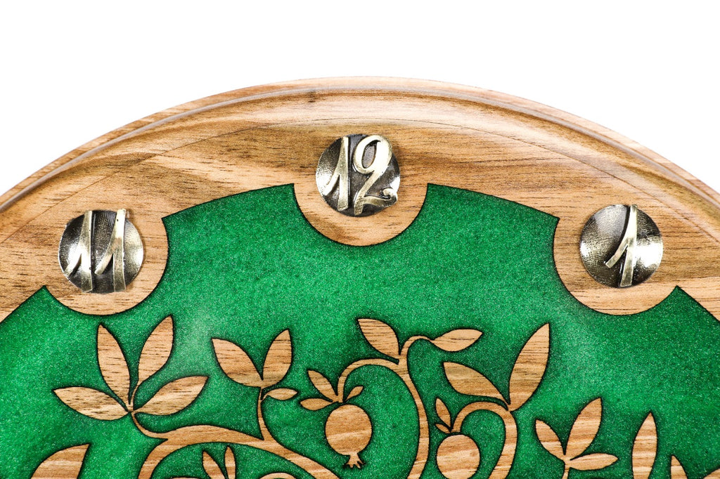 Wanduhr mit Granatapfelbaum