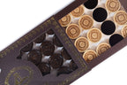 Backgammon Pieces With An Ornamental Pattern