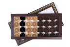 Backgammon Pieces With An Ornamental Pattern